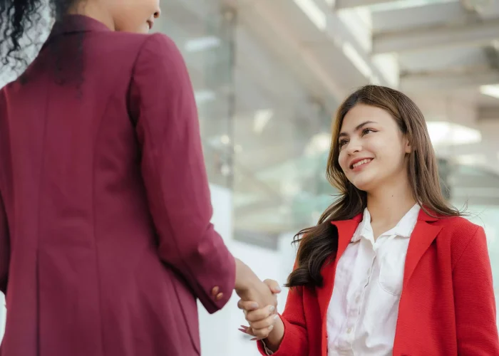 businessmen-shake-hands-after-agreeing-to-start-a-2023-02-10-09-49-27-utc-scaled